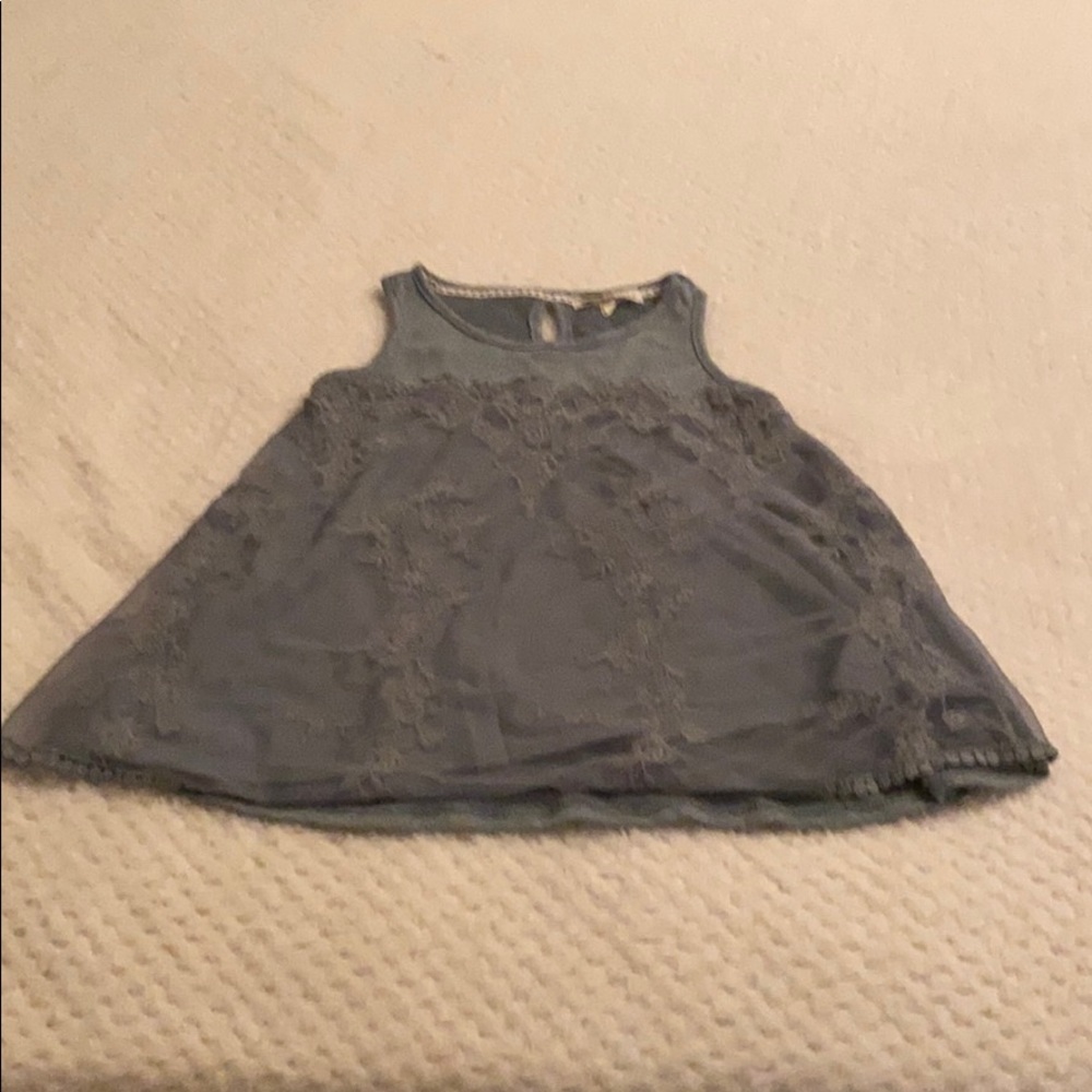 I am selling a green tank top.